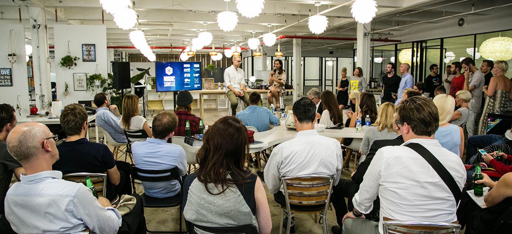 Nordic startups listning at two people speaking at the NordicMade showcase in New York