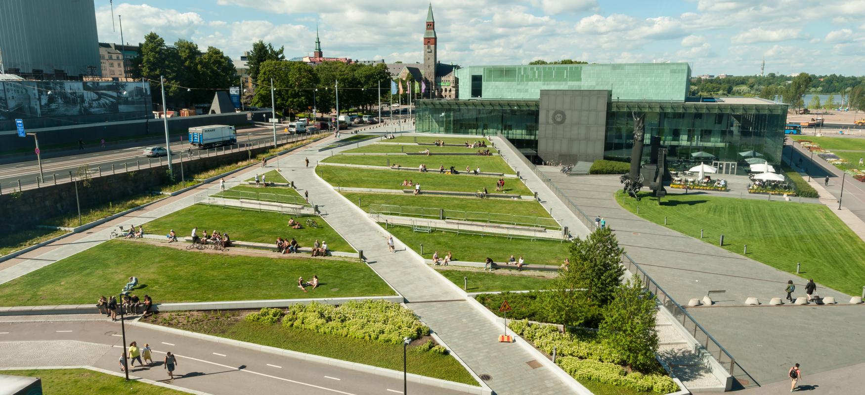 Green park area next to a highway