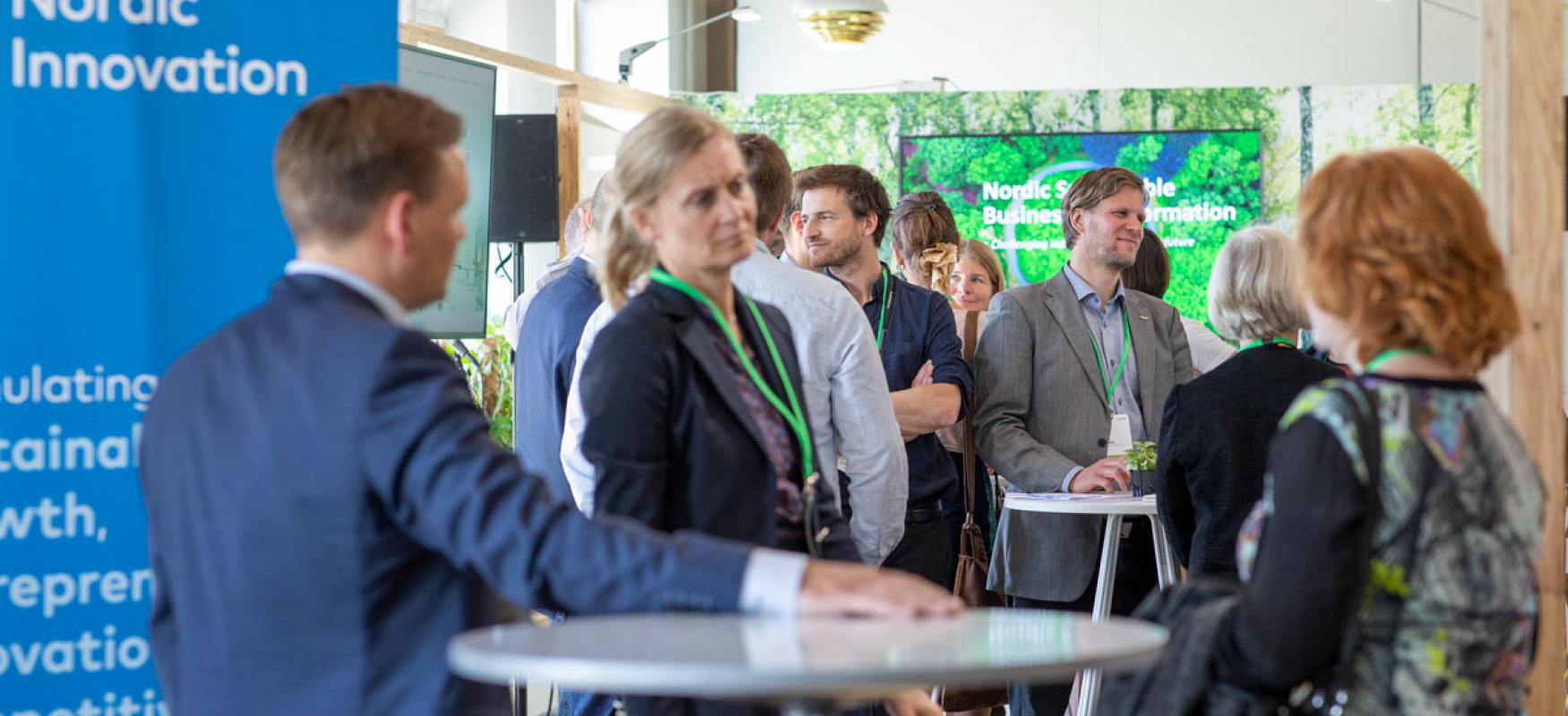 People at the Nordic Innovation stand at World Circular Economy Forum 2019
