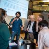 Participants from different projects discussing ideas and possible collaborations at the kick-off meeting for the projects at DogA in Oslo.