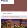 Image of the publication frontpage showing the waterfront of a city at night.