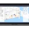 Illustration of a laptop with a map showing a route for autonomous vehicles in a city.