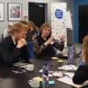 Joy Mogensen talking in a meeting
